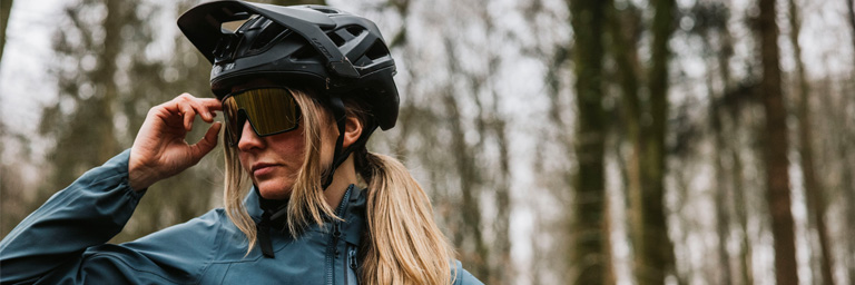 Woman wearing Madison Eyewear sunglasses in the forest