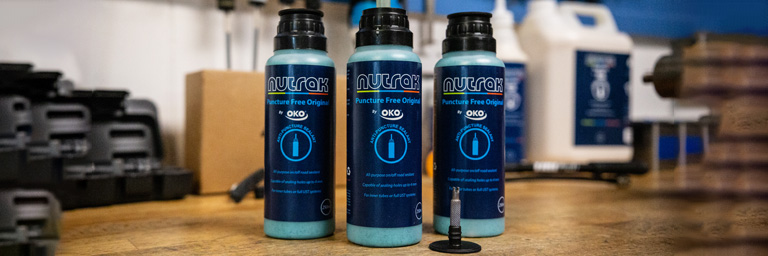 Nutrak Bottles on Workbench